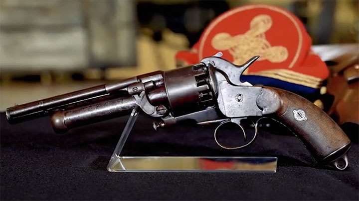 The LeMat revolver with its shotgun barrel visible under the main barrel.