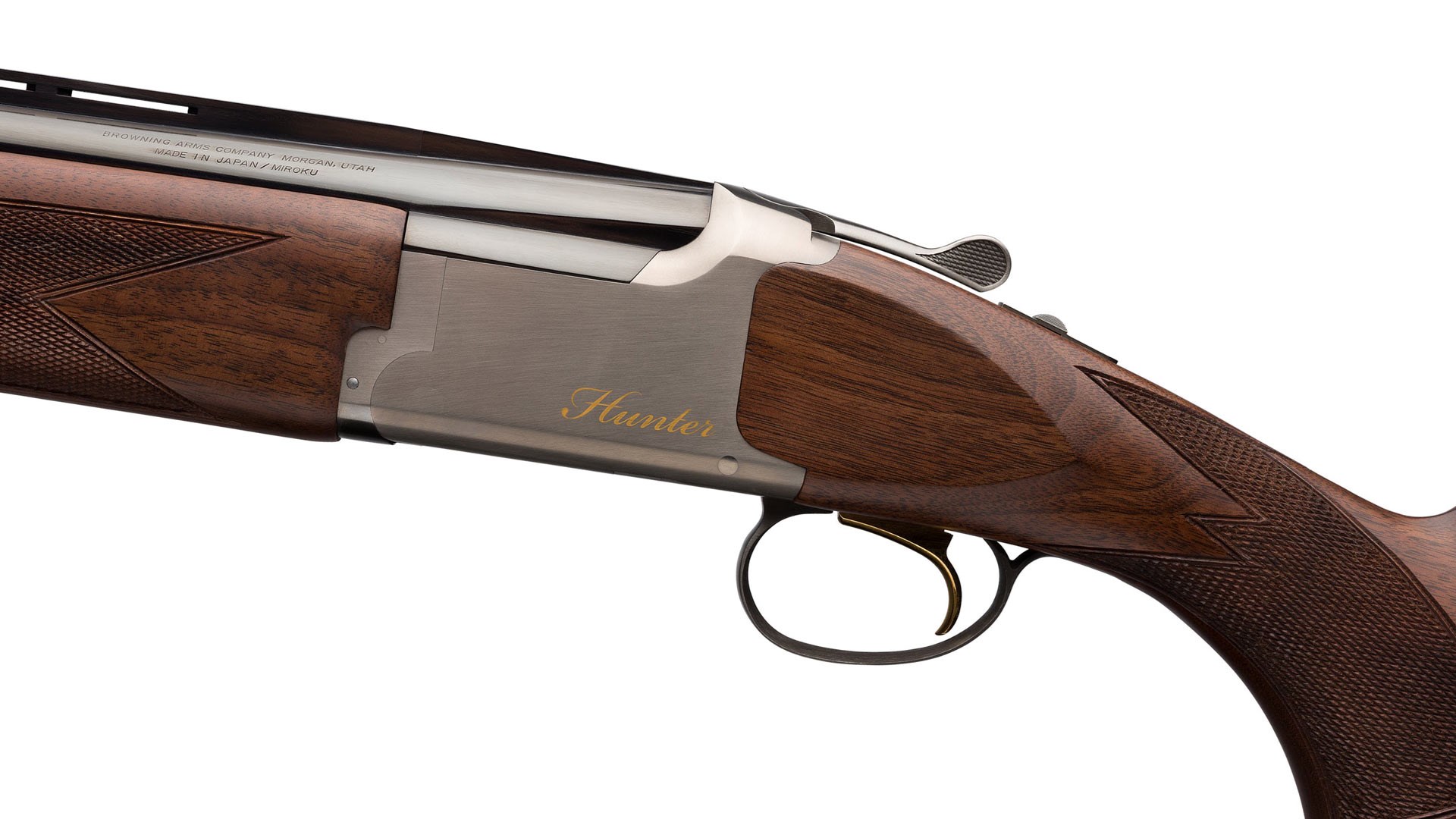 Browning Citori Hunter Grade II left-side view shotgun over-under wood silver receiver blued barrels gold inlay trigger