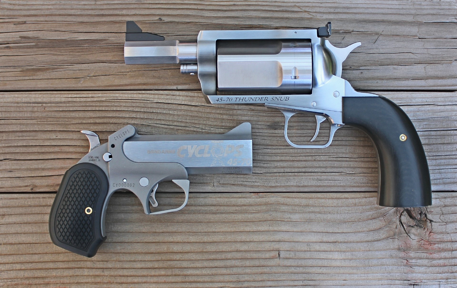 The 54.7-oz. 3” barrel, 5-shot BFR ‘Thunder Snub’ revolver (Top right) compared to the 28-oz. single-shot Cyclops.