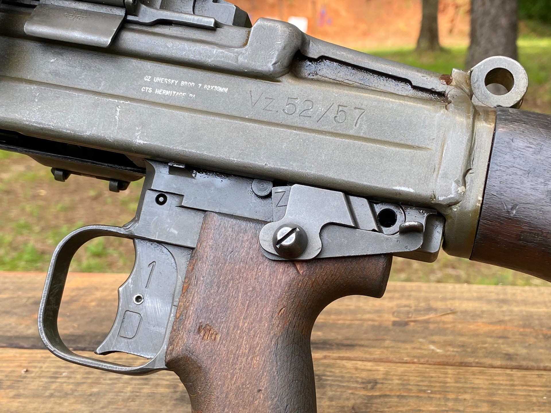 Close-up of the left side of the receiver of a Post-86 Dealer Sample vz. 52/57 light machine gun in 7.62×39 mm showing its MG34 type double-trigger and the release lever/safety that allows the pistol grip to function as the cocking handle. Image courtesy of Martin K.A. Morgan.