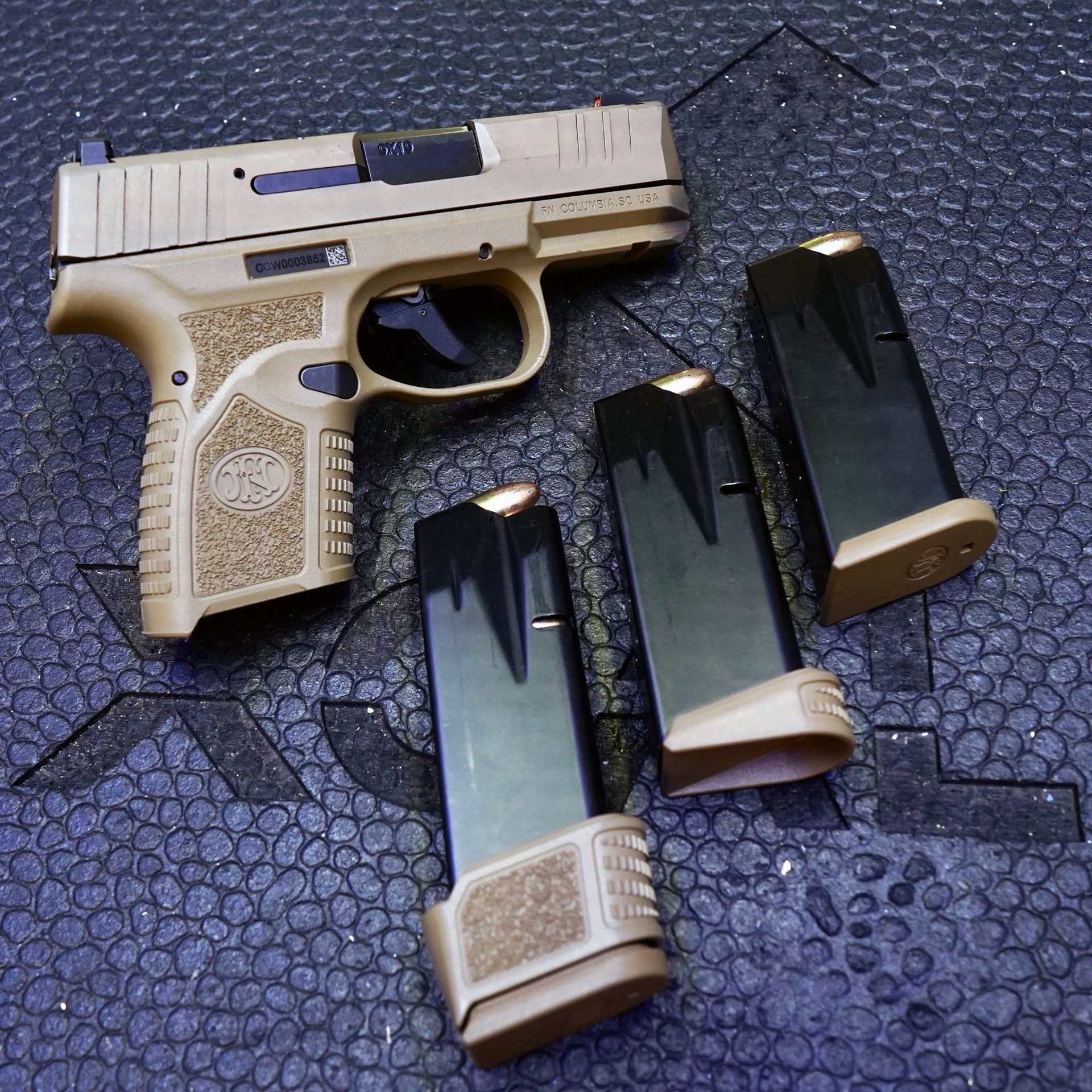 FN America Reflex pistol handgun micro-compact 9 mm three magazines ammunition bullets mags