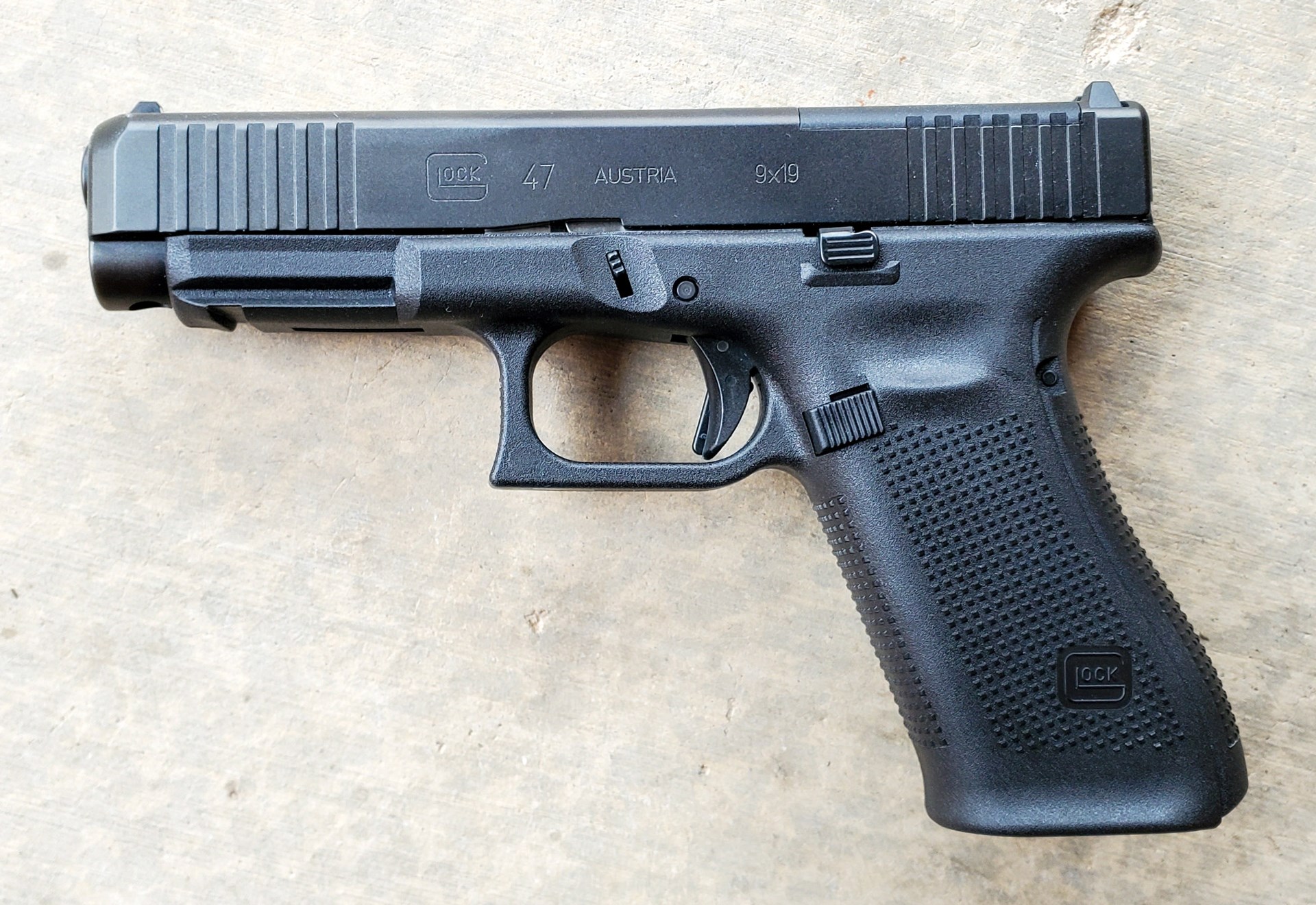 Left-side view of Glock 47 MOS pistol handgun black 9 mm gun