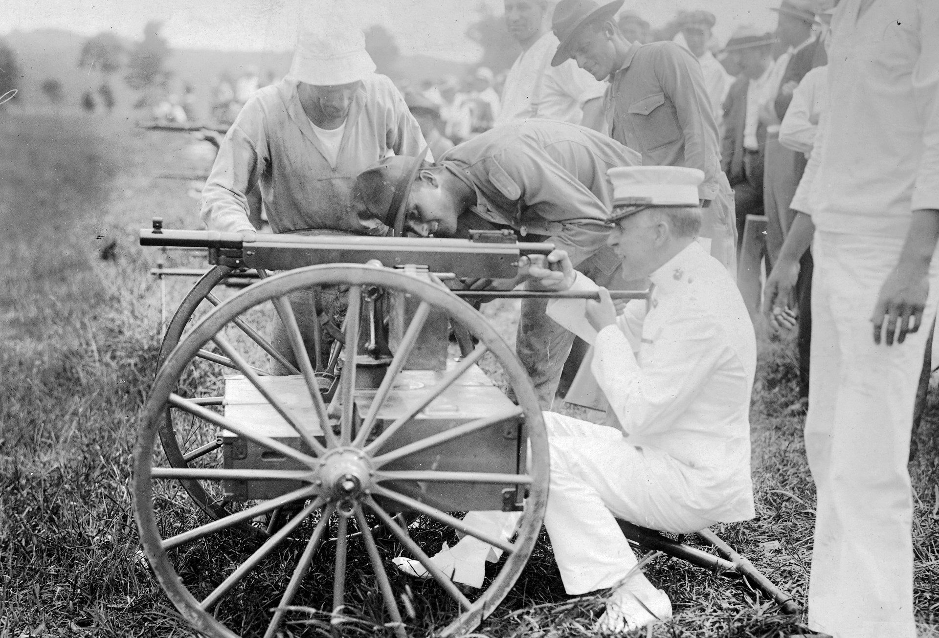6)	General Barnett tests “Colt’s Automatic Gun” at the Winthrop, Md., range during 1917.