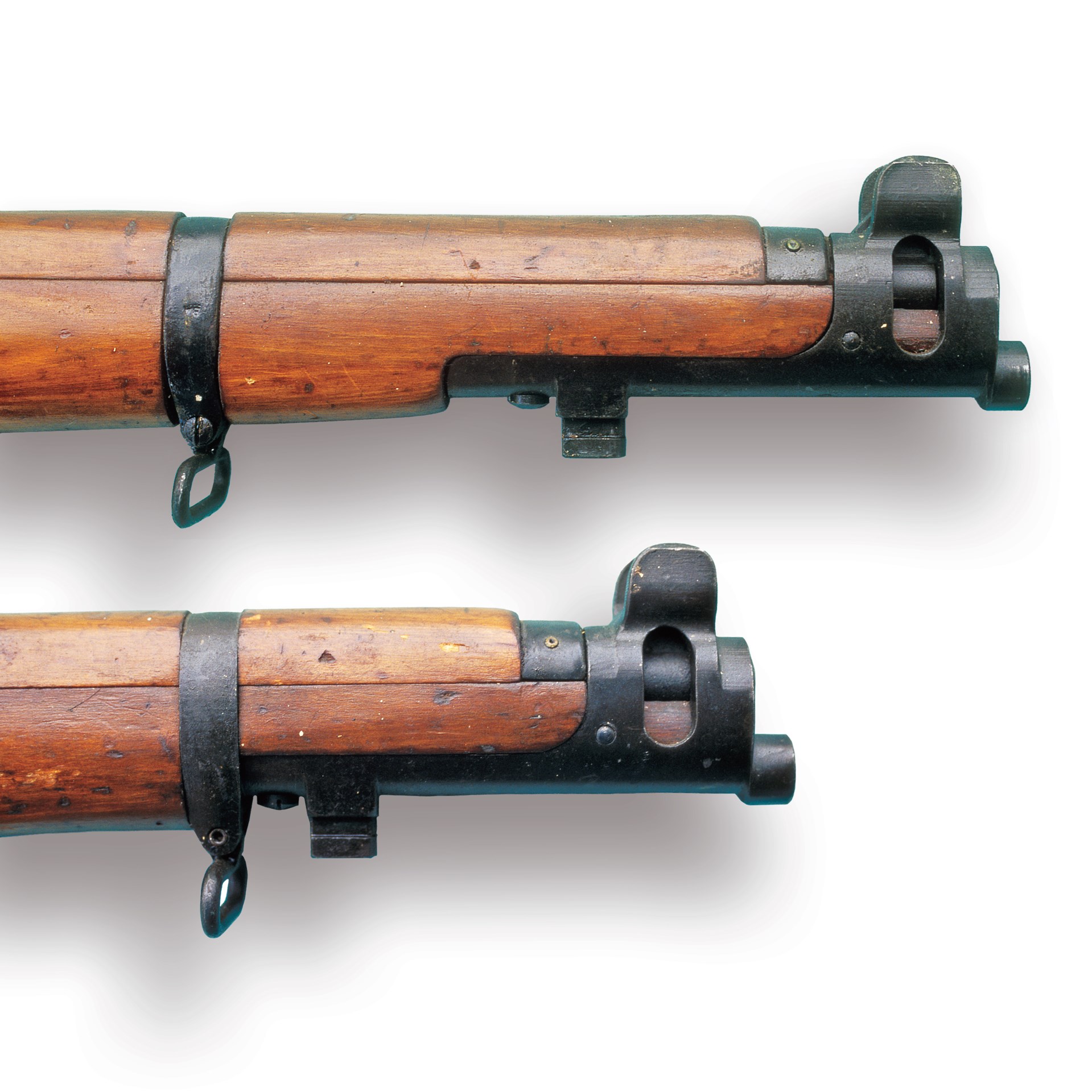 No. 1, Mk. III* ”intermediate rifle” fore-end, nosecap and bayonet lug shown above No. 1, Mk. III* ”shortened rifle” fore-end, nosecap and bayonet lug