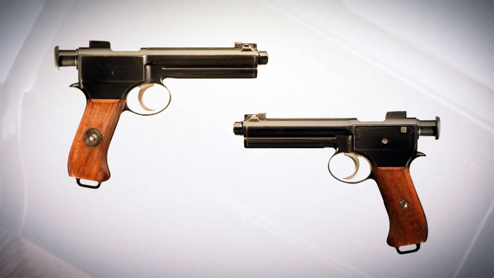 Left and right profile view of the M1907 Roth-Steyr pistol.