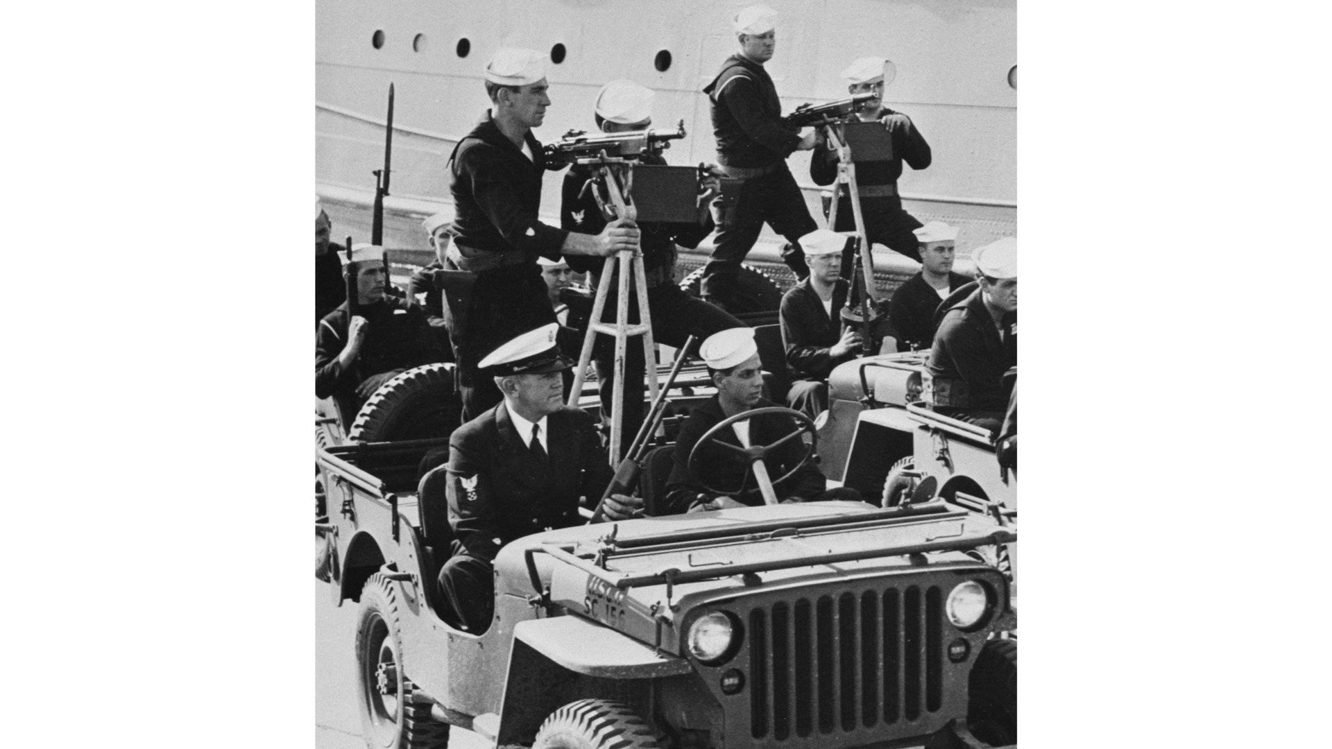 11)	Service in World War II: M1895 guns mounted aboard U.S. Coast Guard Jeeps for stateside shore patrol during 1943. national archives photograph