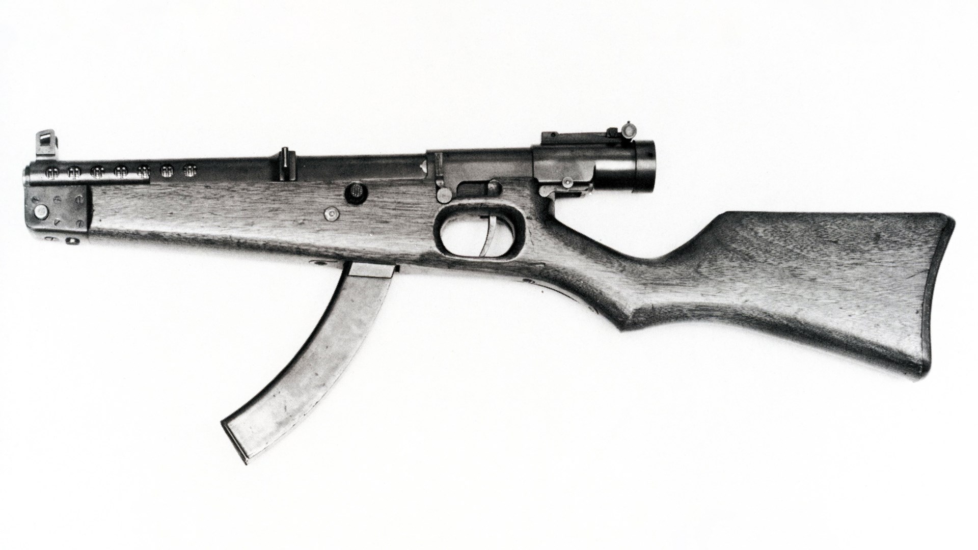 Type 2 japanese submachine gun left-side view shown with wood stock and curved magazine