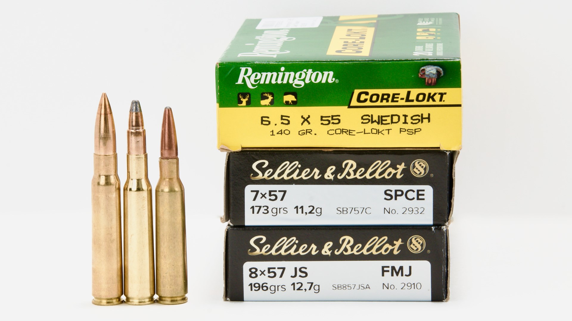 three ammunition types for mauser rifles boxes on right cartridges brass on left vertical