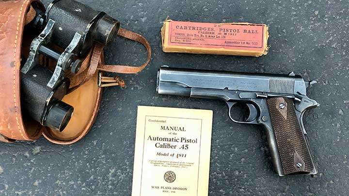 Some of Capt. McKee&#x27;s items from the war. His 1918 Colt manufactured Model 1911 service pistol along with his field binoculars, a May 1918 dated M1911 manual and a box of Frankford Arsenal .45 ACP ammunition from the period.