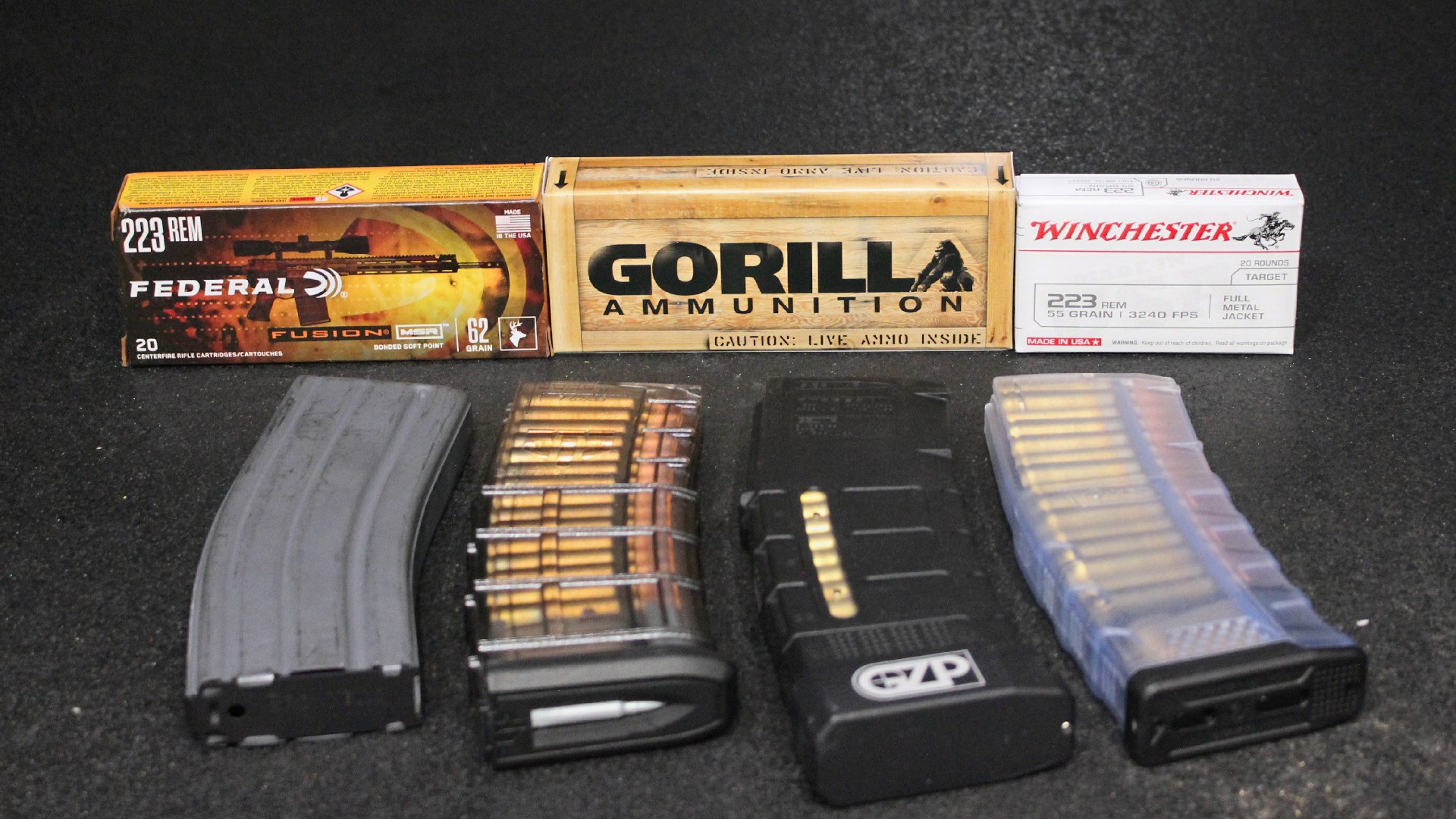 Ammunition boxes shown with detachable box magazines fully loaded Federal, Gorilla, Winchester boxes