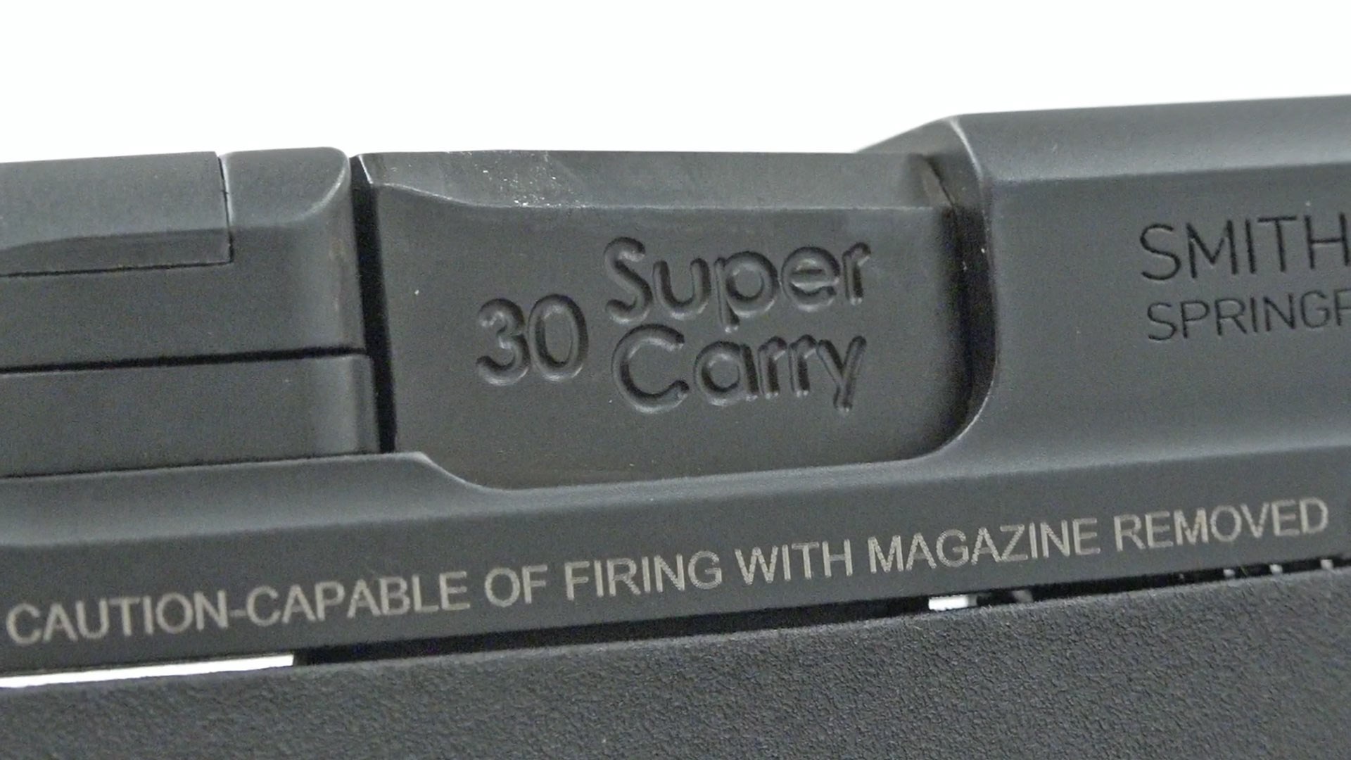 close-up view pistol black metal stamping steel