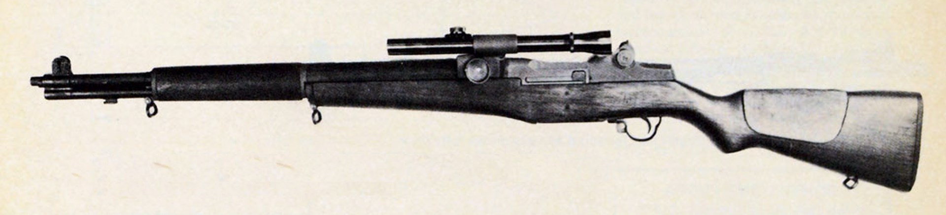 Adjustable cheekpiece shown flush with stock for iron sight use.