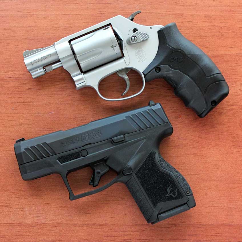 Taurus GX4 black semi-automatic comparison next to stainless steel revolver