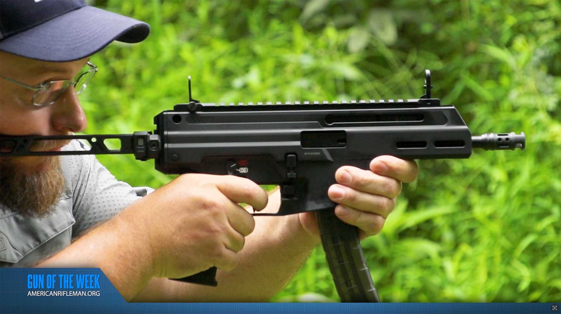 Man aiming the Springfield Armory Kuna on an outdoor range.