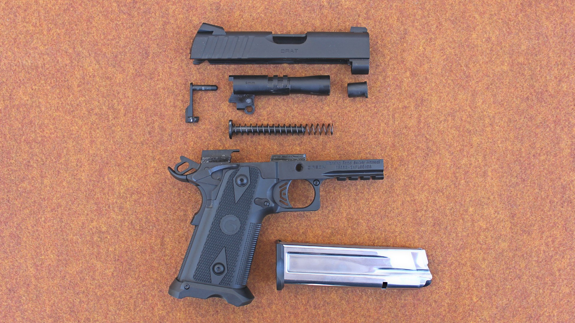 EAA Brat Witness2311SC pistol right-side view disassembled slide barrel spring frame magazine