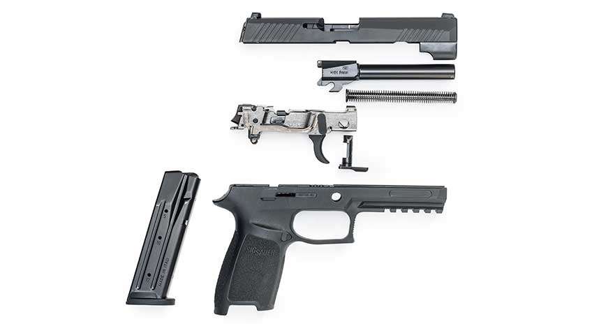 SIG Sauer P320 disassembled on white, showing magazine, polymer grip frame, serialized chassis, barrel, slide and recoil spring.