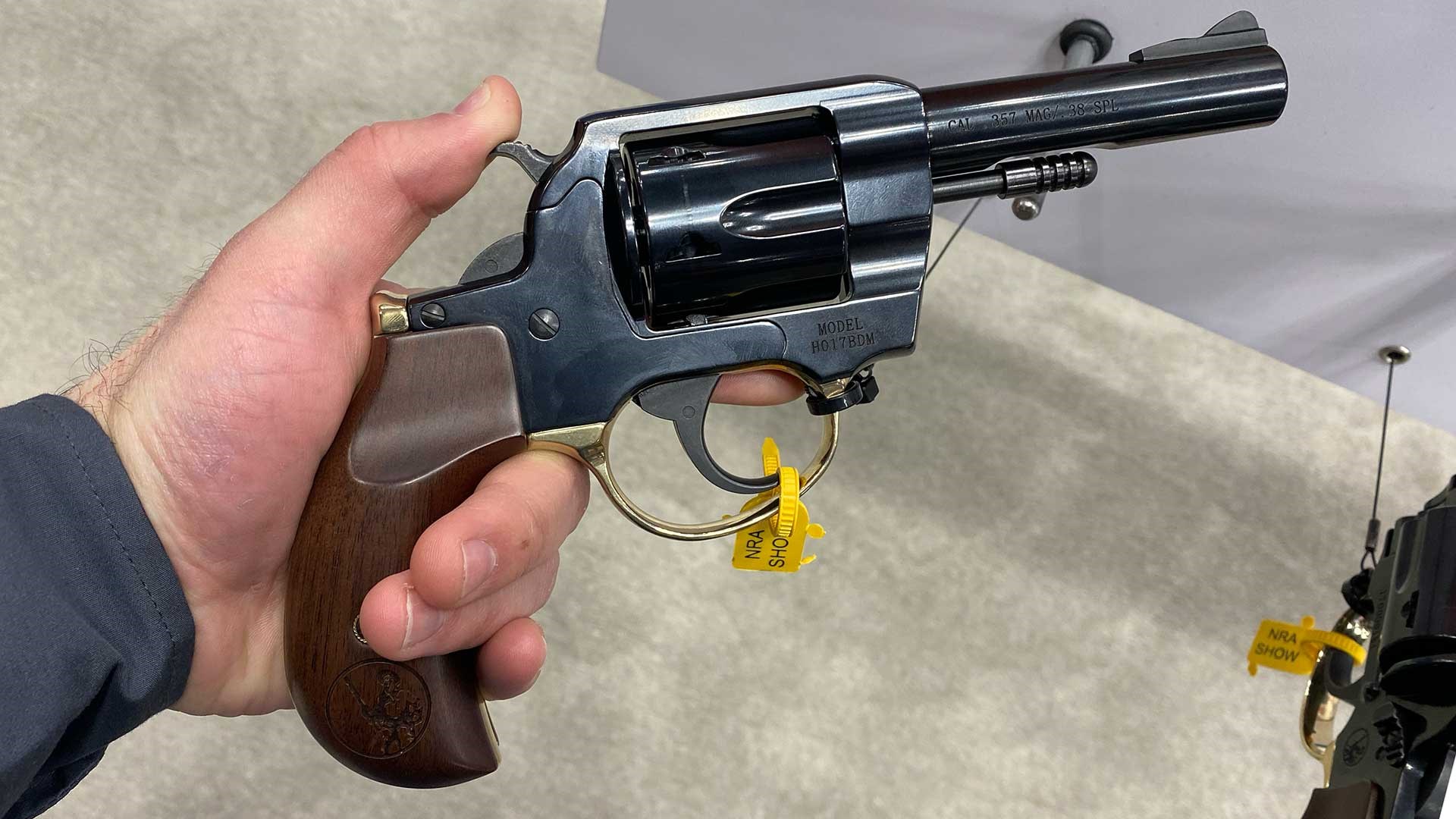 A hand holding the Henry Big Boy revolver with a birdshead grip.