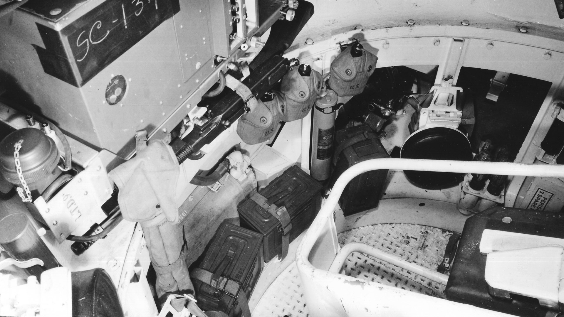 A M1928 Thompson SMG secured inside the turret of a M4A2 Sherman tank