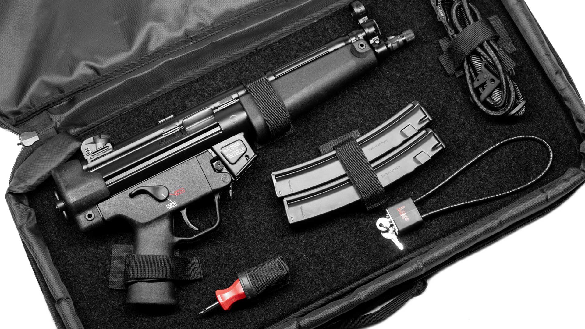 case bag compartment black enclosure with gun parts pistol handgun magazine tools lock