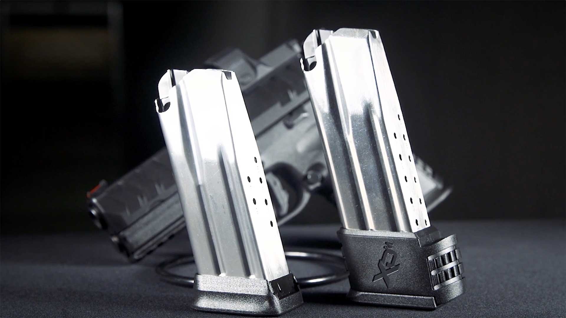 Standard flush fit magazine next to an extended 15-round magazine for the Springfield Armory XD-M Elite Compact.