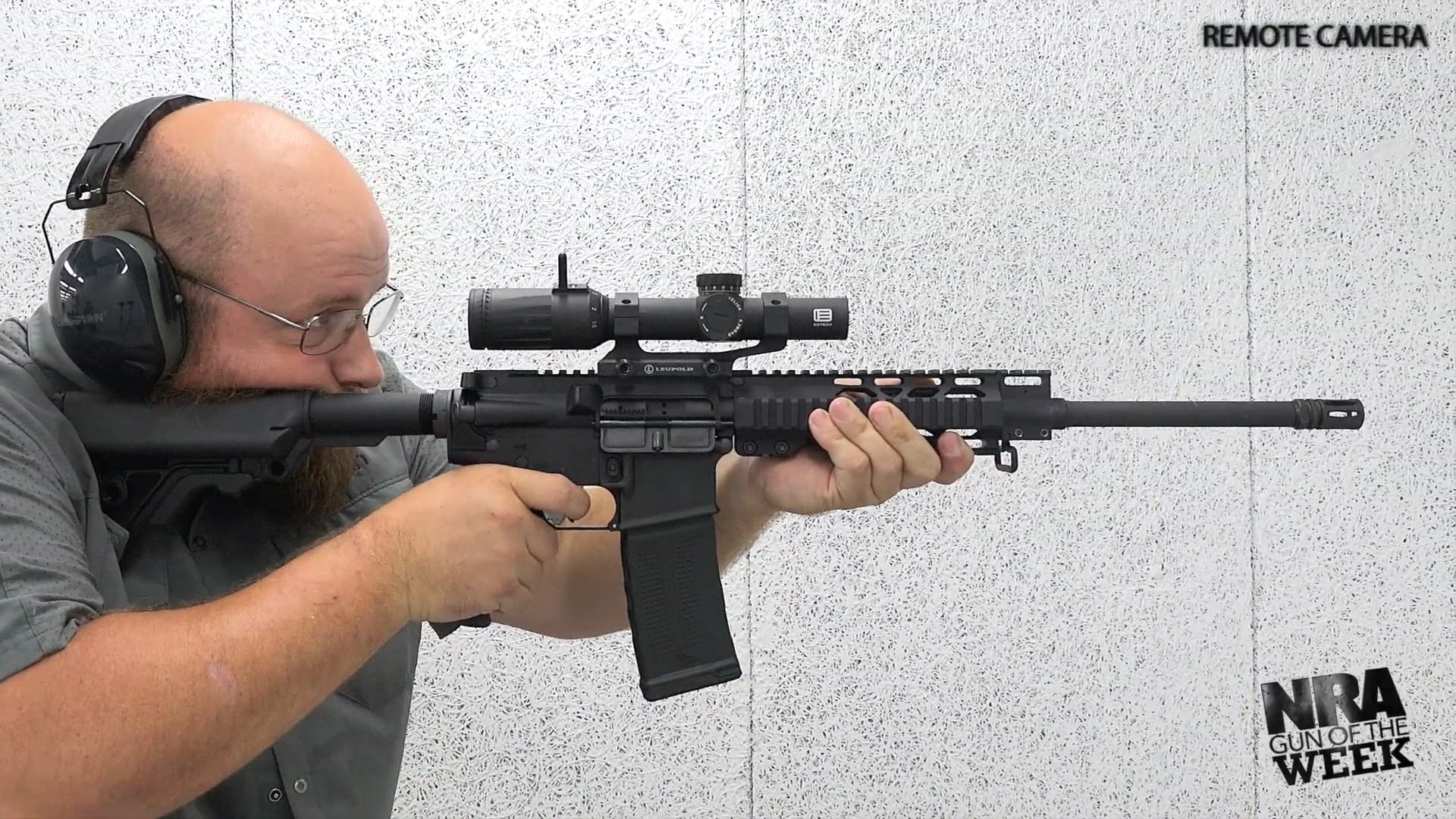 man with Rock River Arms rifle shooting range