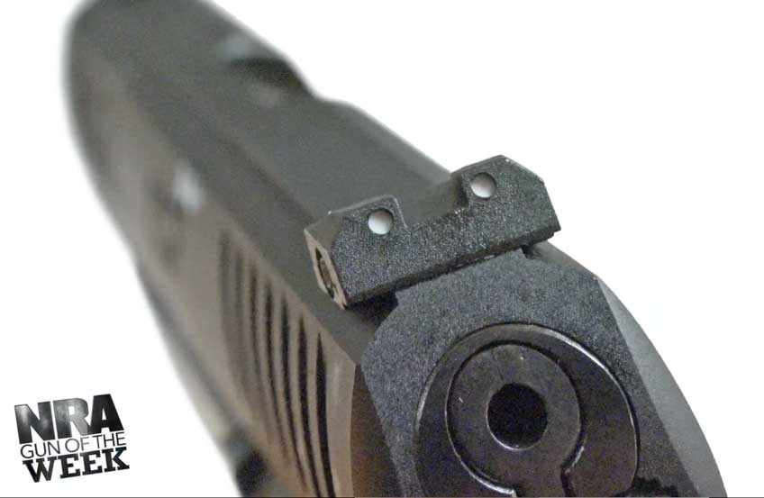 Rearview of pistol slide on white background.