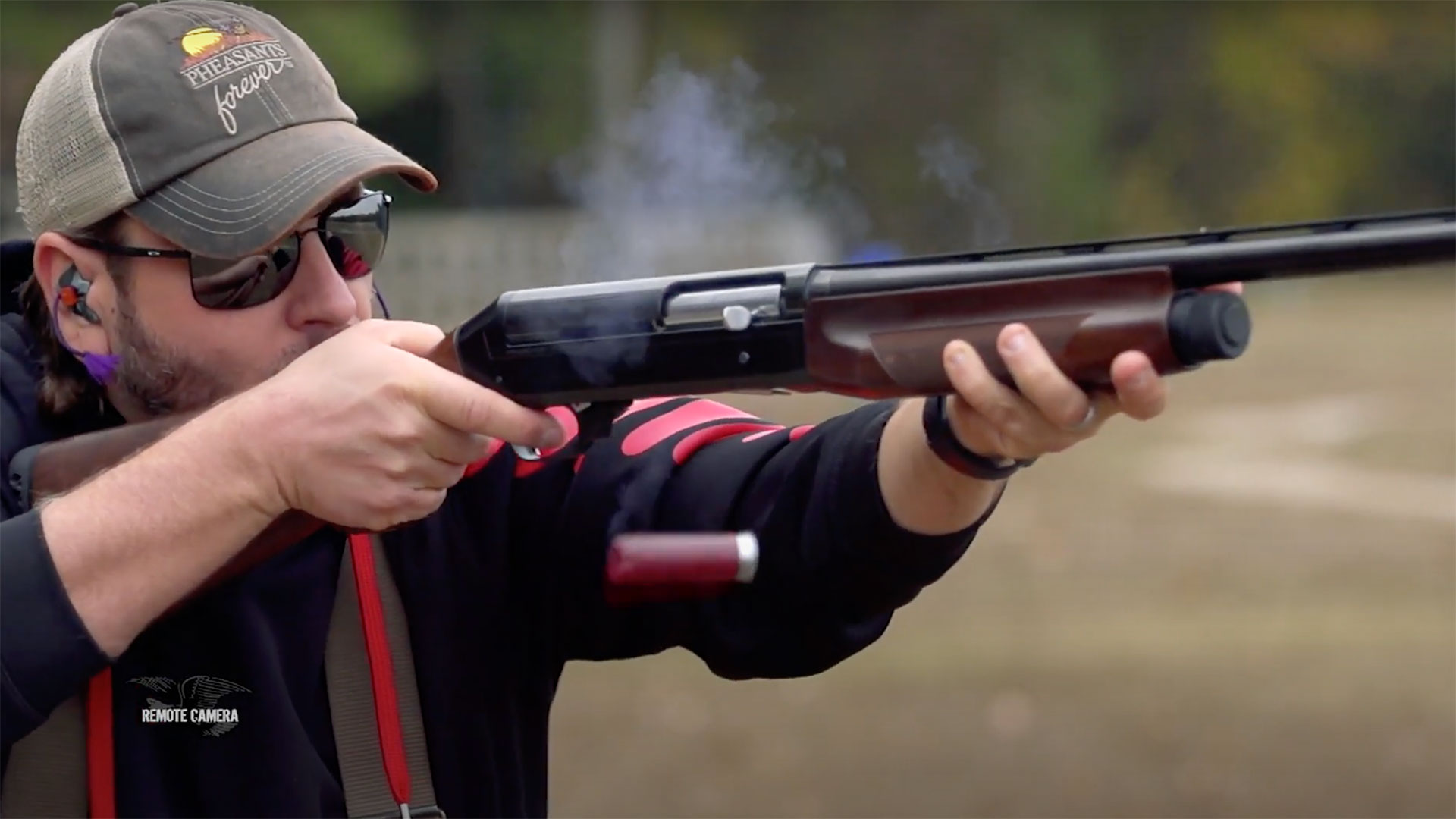 Firing a Benelli Super Black Eagle Shotgun on the range.