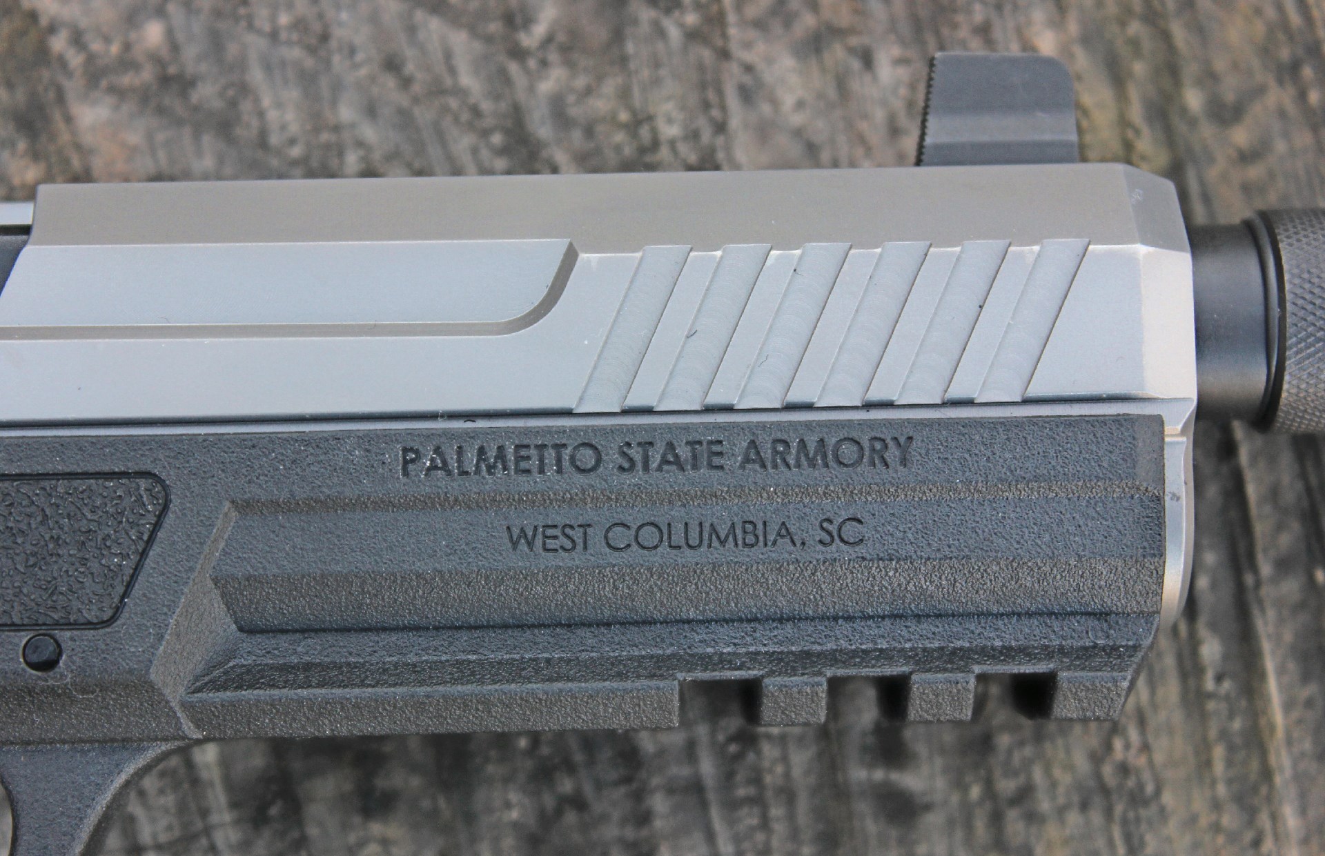 Palmetto State Armory West Columbia, SC stamping on gun frame two-tone stainless steel slide black ploymer