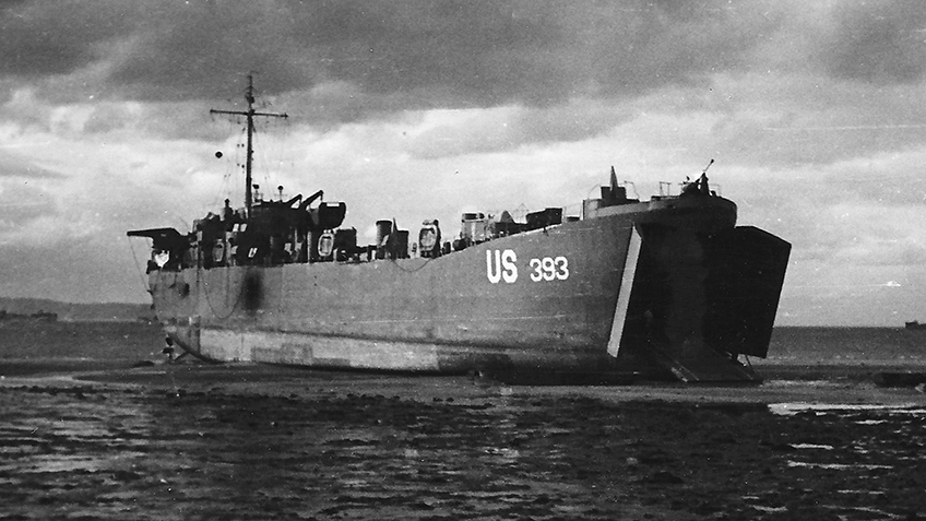 LST 393 left stranded at low tide on Omaha Beach during the Normandy invasions in June 1944.