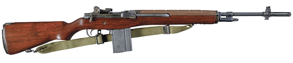 M14 wood-stocked rifle right-side view shown with web sling and detachable box magazine wood stock flash hider