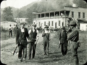 Miners turn in guns to U.S. Army Regulars