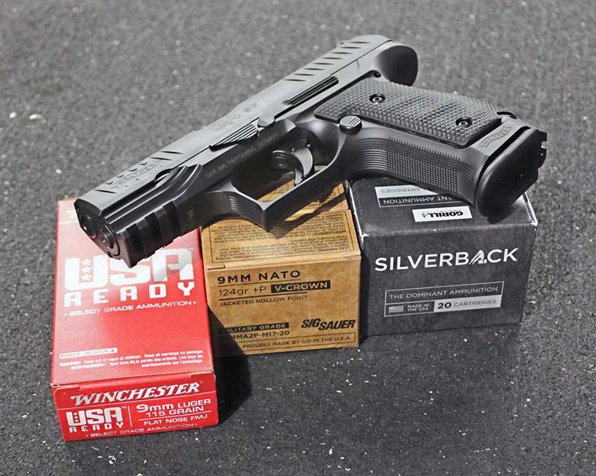 Walther Arms Q4 steel frame handgun pistol on ammuntion boxes winchester sig sauer silverback