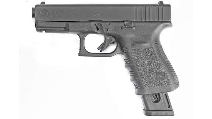 When installed, the steel slide of the Tactical Solutions TSG-22 .22 LR conversion nearly duplicates the weight and balance of a centerfire Glock 19. Magazines are universal for both full-sized and compact Glocks, so they extend beyond the grip when used with a compact model like the Glock 19 pictured.
