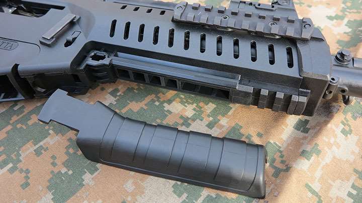 The lower panel cover on the fore-end removed to reveal the mount for the GLX 160 40 mm grenade launcher.