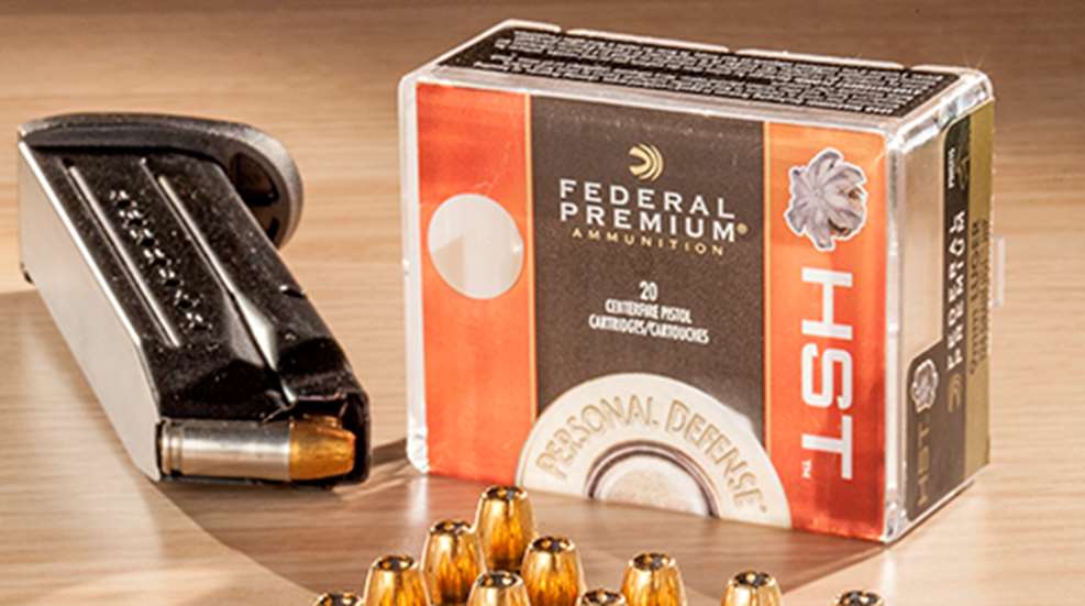 Federal ammunition handgun magazine box bullets on table indoors