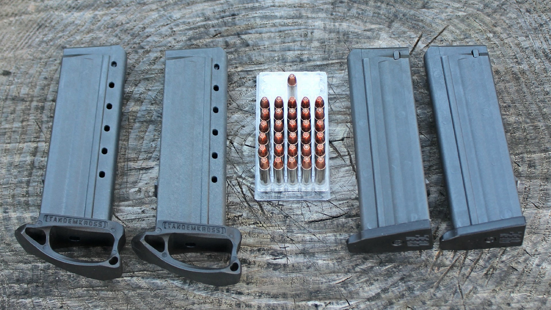 keltec pmr30 magazines with tandemkross baseplate shown with ammunition block on wood