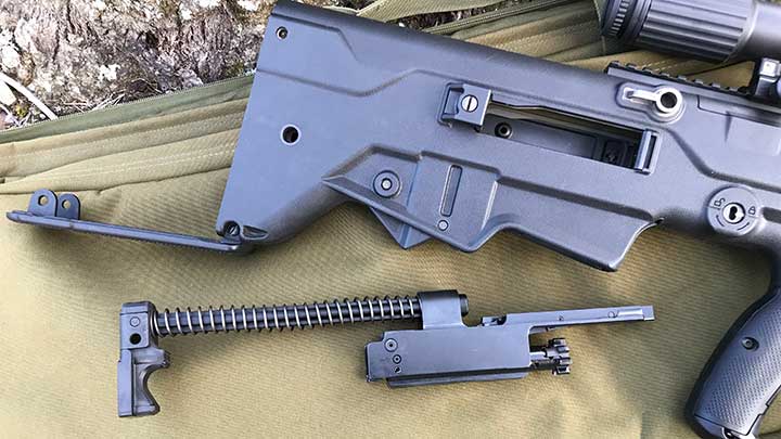 The IWI Tavor 7 field stripped with the bolt carrier assembly removed through the butt.