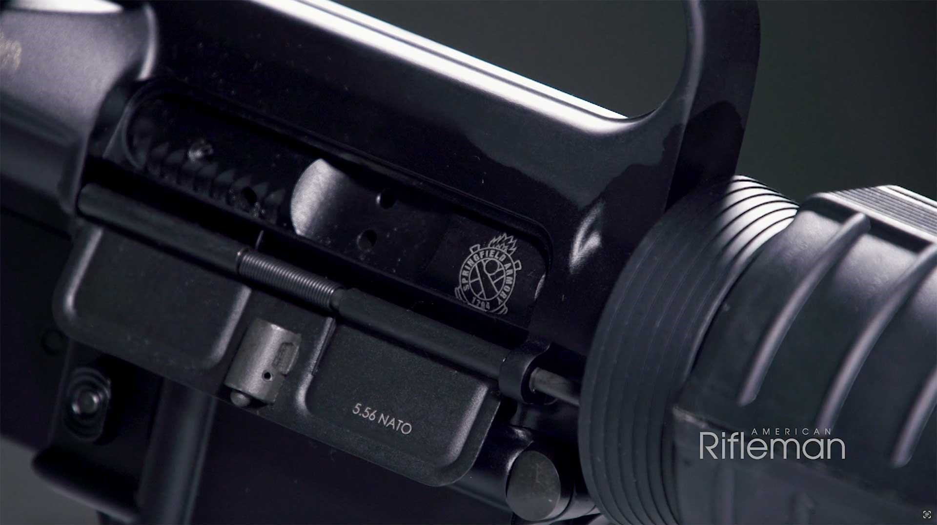 Springfield Armory SA-16A2 bolt seen through the rifle's ejection port.
