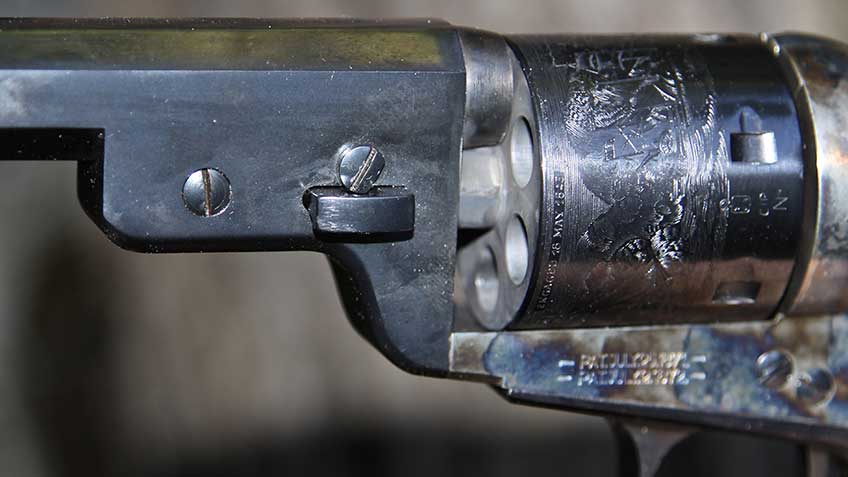 Up-close left-side view of the Uberti Wild Bill 1851 Navy Conversion showing the finish, cylinder engraving, and case coloring.