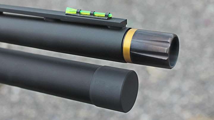 A view of one of the chokes, the ventilated rib, and front fiber-optic bead on the Mossberg 940 JM Pro.