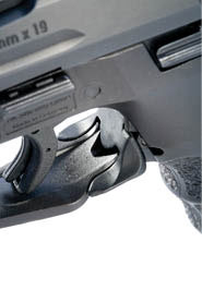 Also visible are the "charging supports" on each side of the slide's rear that allow the shooter greater purchase when retracting the slide. The VP9's magazine release is the HK paddle style at the trigger guard's rear and is completely bilateral.