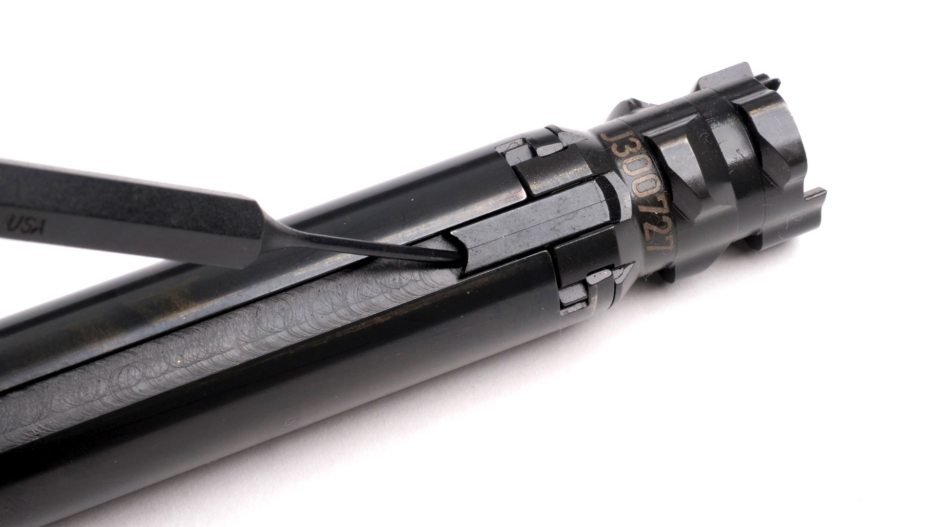 CZ 600-series rifle bolt with punch illustrating extraction engagement