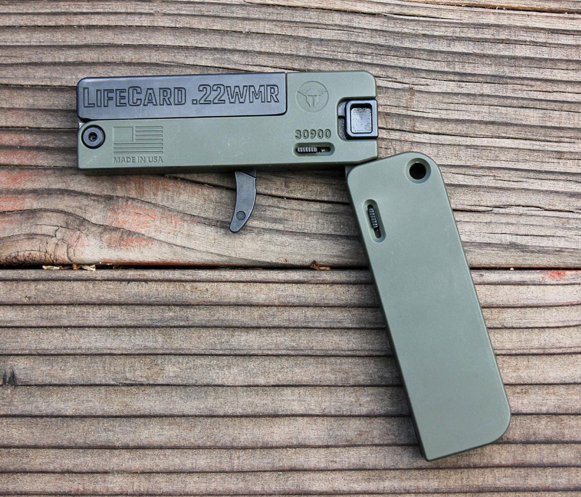 lifecard .22 WMR pistol on wood
