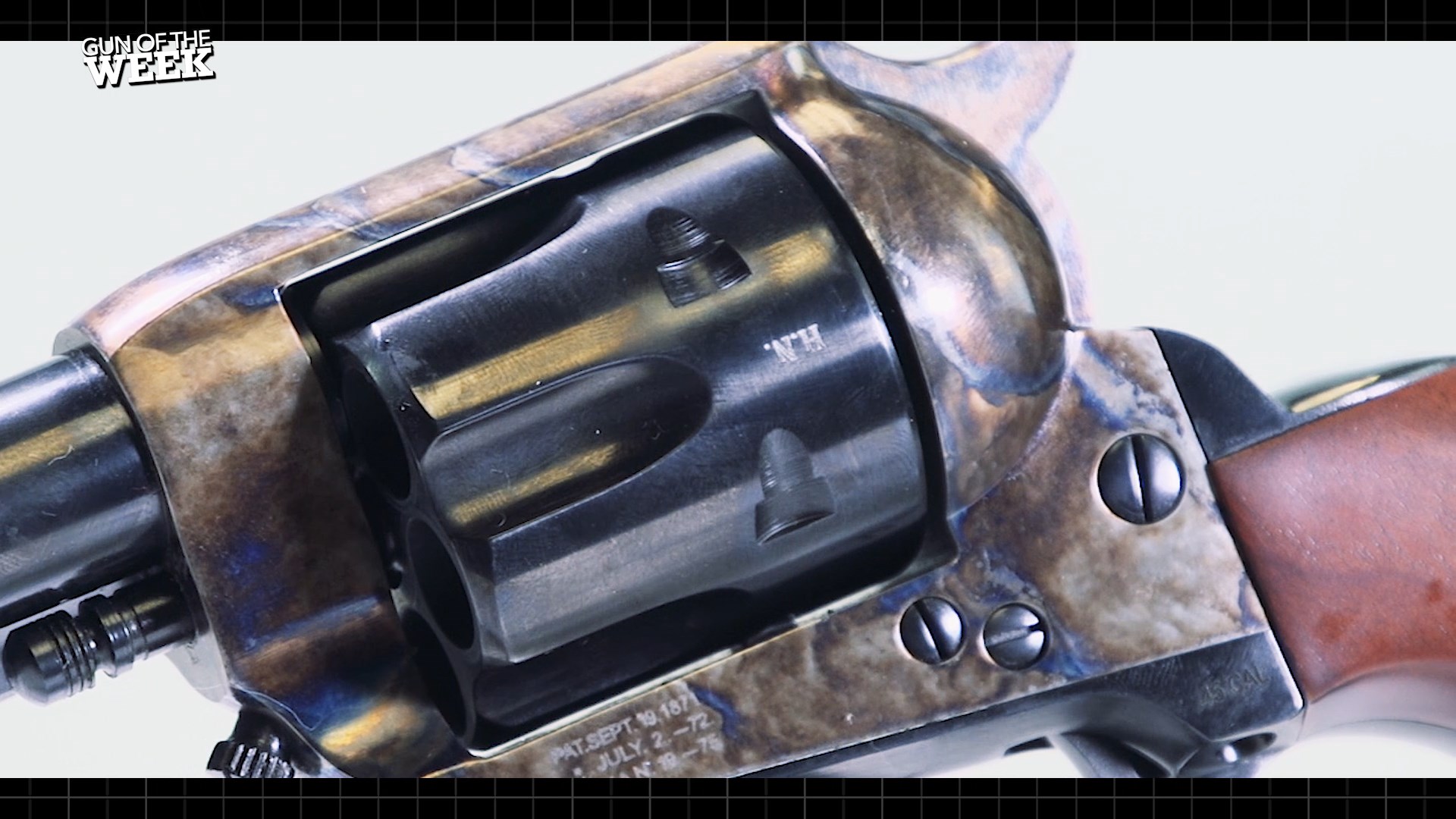 Cimarron Firearms Model P Henry Nettleton inspector marking on blued cylinder case-hardened finish frame colores swirl patterns gun revolver .45 Colt engraving