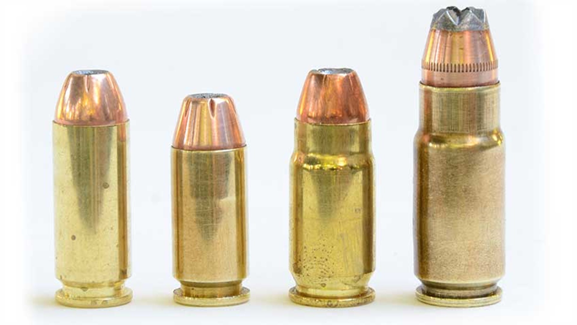 Bullets cartridges brass cylinders ammunition ammo line row picket fence arrangement on white