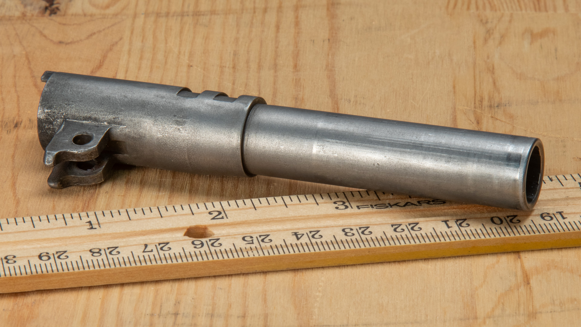 gun barrel and ruler