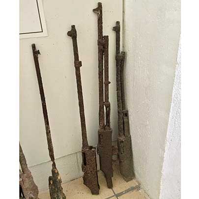 Five M1918A2 Browning Automatic Rifles in relic condition on display in Peleliu’s museum.